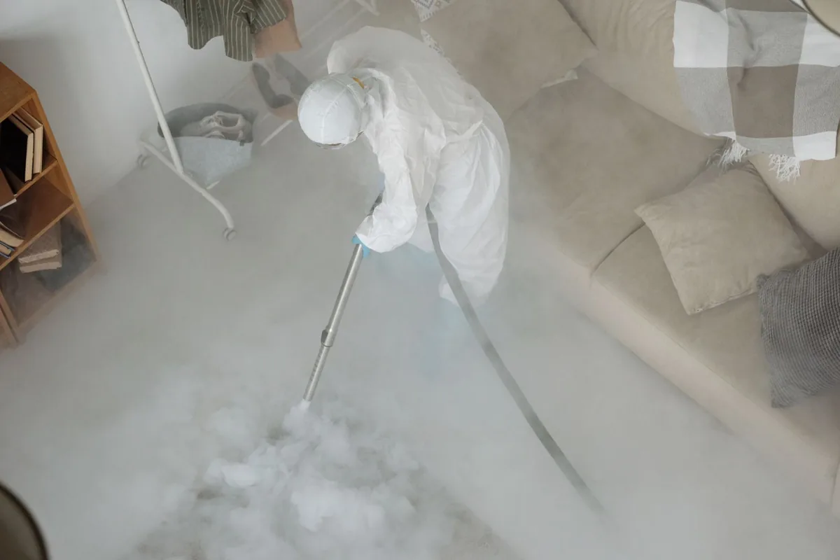 Biohazard cleanup technician in protective equipment, White Pigeon, MI